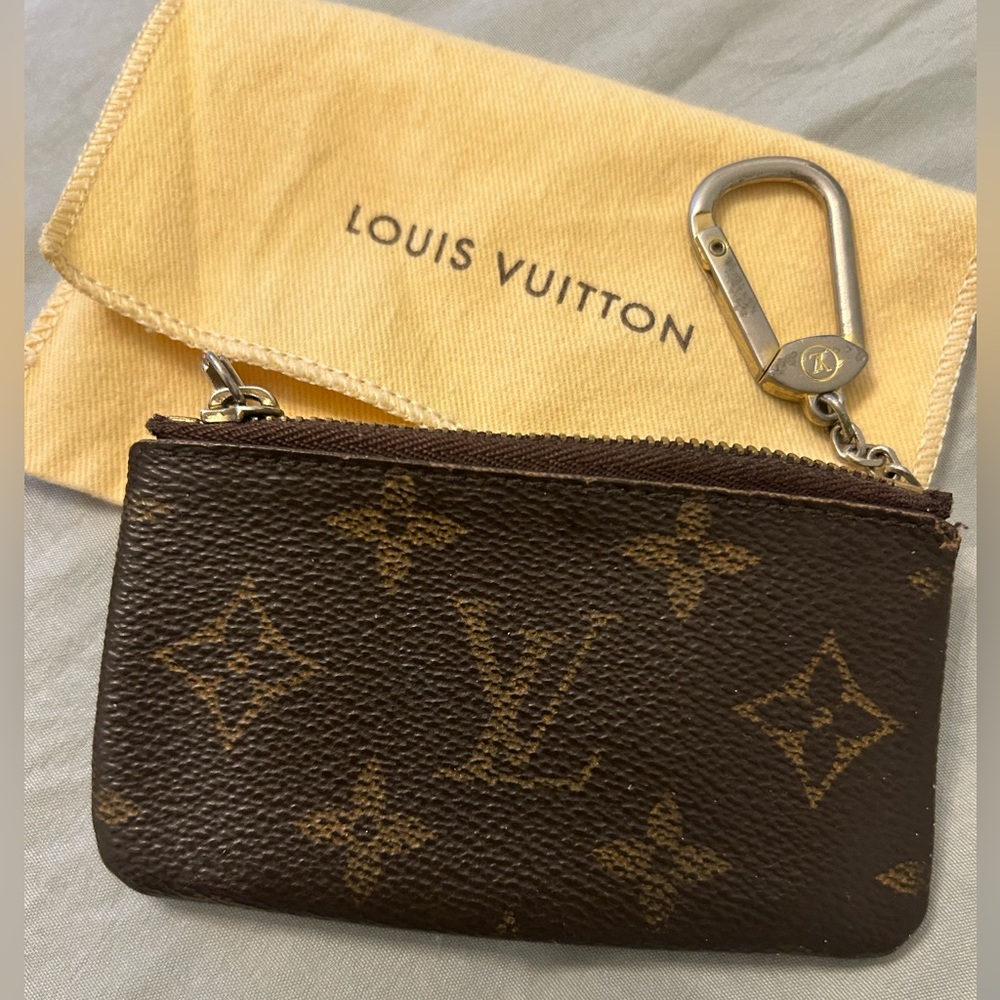 Louis Vuitton authentic key pouch with dust bag.